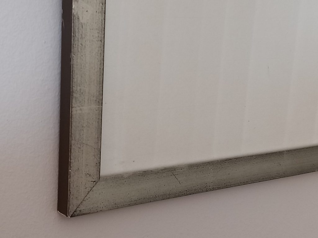 Détail de baguette simple dorée à la feuille d'or blanc